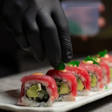 Finishing a roll by hand - ENSO Japanese Fusion & Bar, Jl. Tanah Barak No.19, Canggu, Bali
